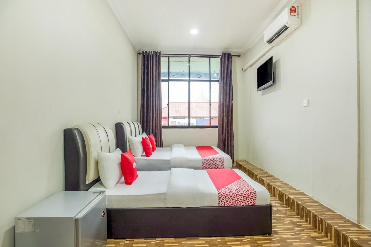 Oyo 89712 Grand Inn Semporna Exterior foto